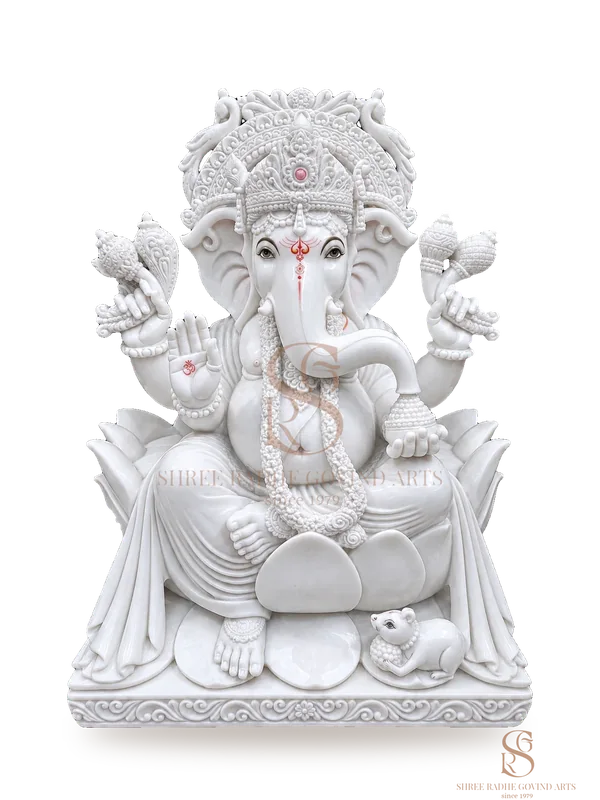 Ganesh ji seated on a lotus in white marble