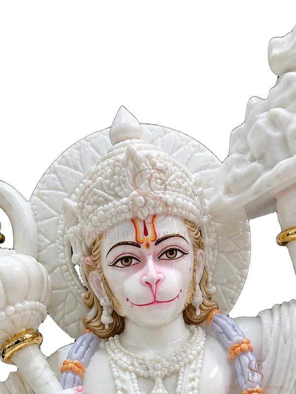 Close-up of the face and crown of the Hanuman ji with Sanjeevani